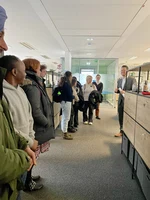 Prof. Dr. Matthias Ehmann (Ewersbach) leads participants on a tour of the Allianz-Mission Headquarters on the TH Ewersbach Campus
