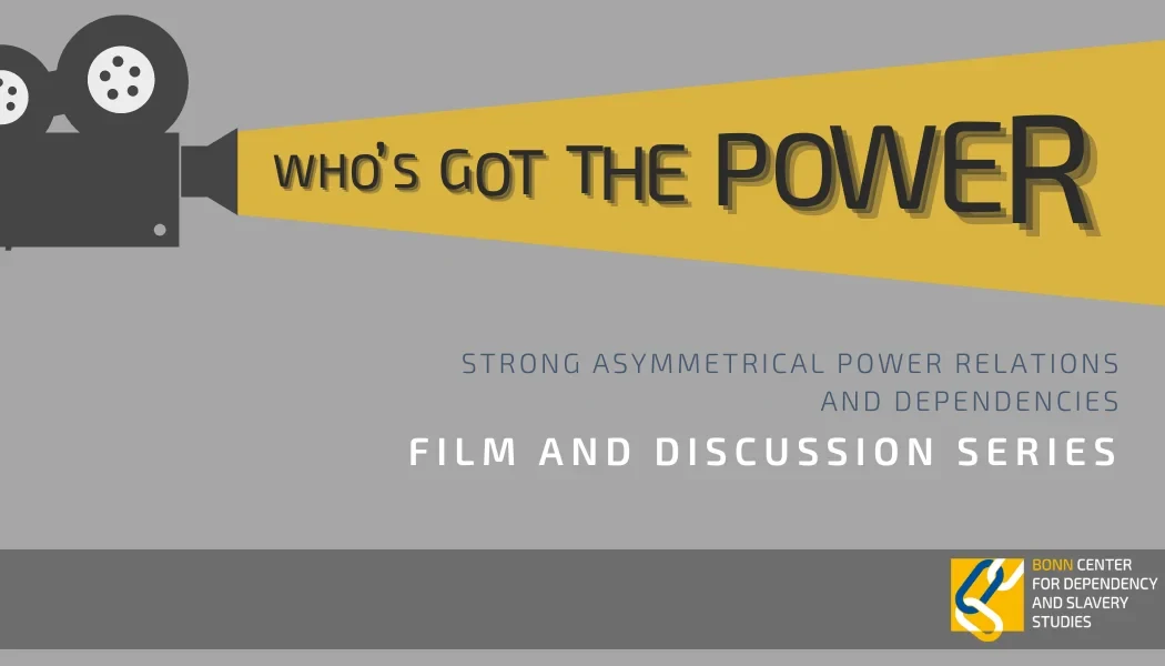 Eine Wissenschaftlerin und ein Wissenschaftler arbeiten hinter einer Glasfassade und mischen Chemikalien mit Großgeräten.