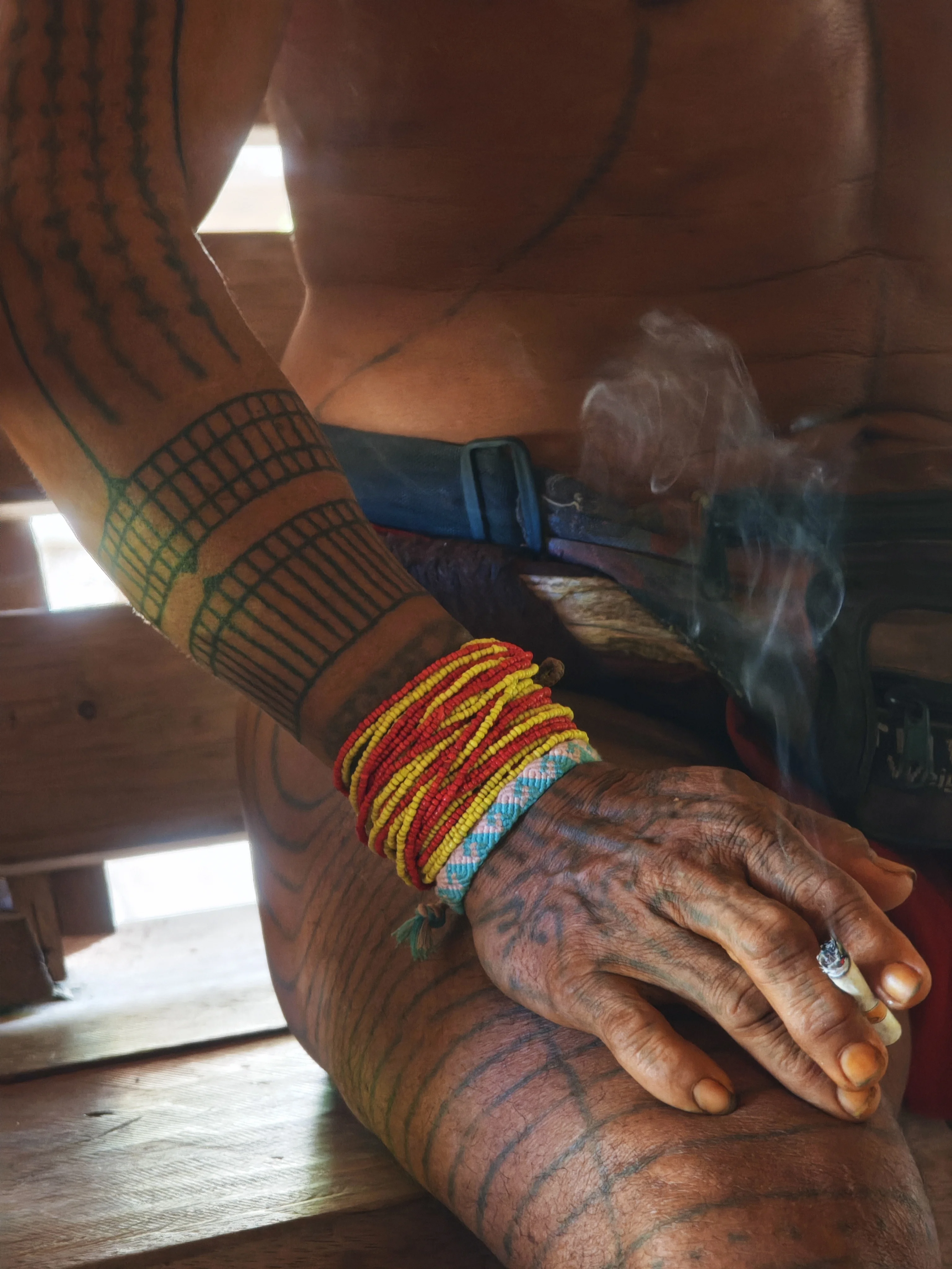 Member of the indigenous Mentawai tribe of Siberut Island, Indonesia, showing sacred tattoos (titi) including a record of the wearer’s environment; ©Wikimedia. Courtesy of Artur Huryn (RA E)